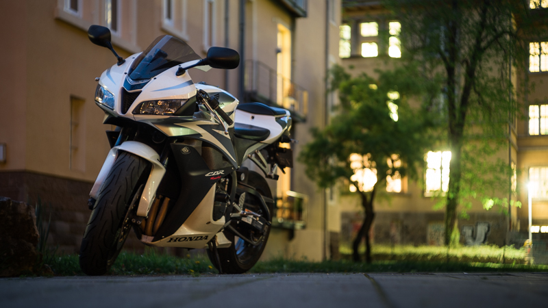 jupiter-3 50mm 1.5 sony alpha 7s bokeh blue hour citylights vespa honda cbr motobike