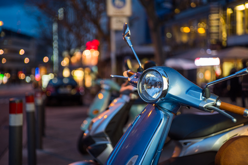 jupiter-3 50mm 1.5 sony alpha 7s bokeh blue hour citylights vespa